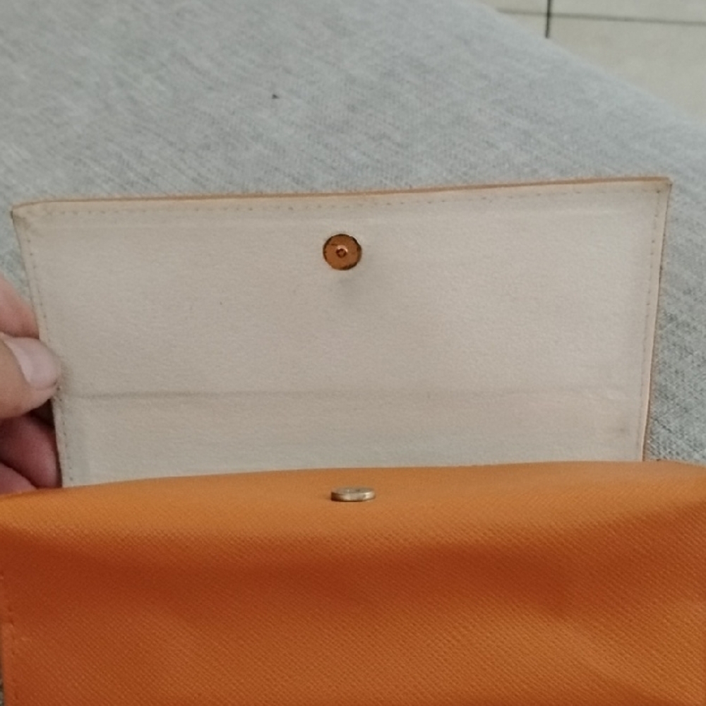 Tory Burch Orange glass case with Silver Logo - Picture 8 of 12